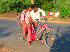 Fotografier barn på sykkel