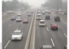 Fotografier motorvei med forurensning i Peking